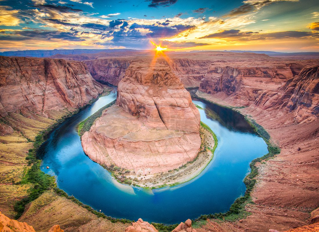 About Our Agency - Aerial View of Horseshoe Bend, Grand Canyon During Sunset
