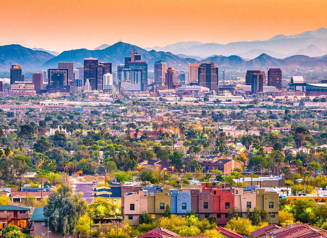 Contact - Aerial View of Phoenix Arizona With Color Buildings and Mountain Ranges
